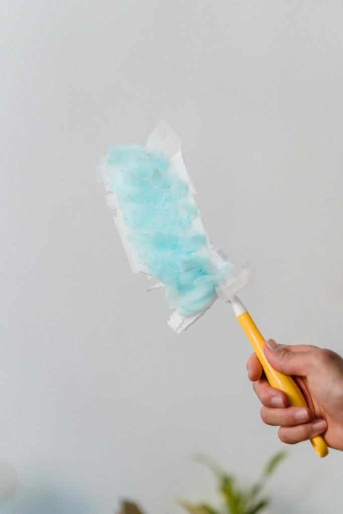 pexels-photo-9462111 Person Holding Yellow Handle Swiffer